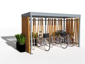 Refugio para bicicletas de diseño con estructura metálica y paneles de madera, decorado con plantas verdes, ideal para empresas o ayuntamientos.